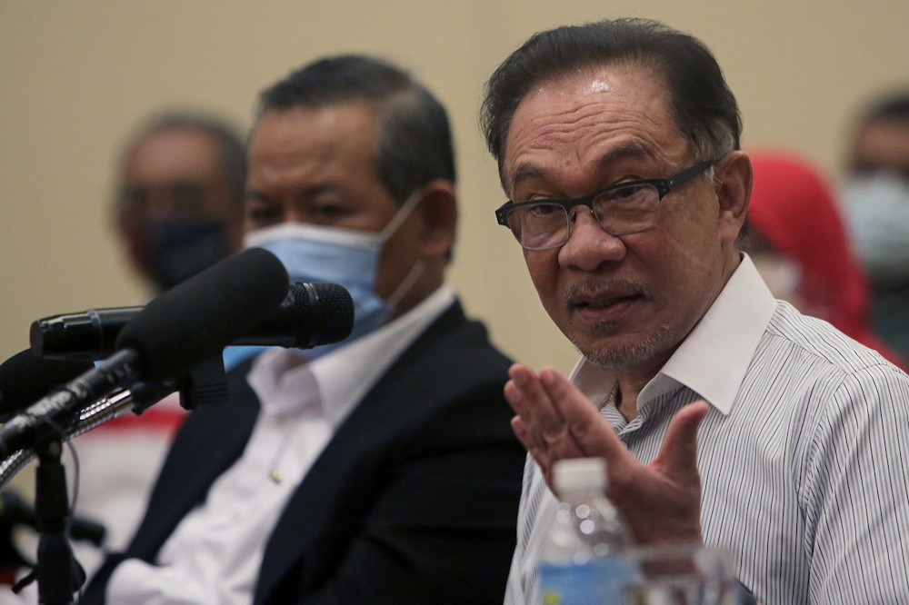 PKR president Datuk Seri Anwar Ibrahim speaks to the media as PKR welcomed 15 individuals with an Islamic background, Port Dickson April 12, 2021. u00e2u20acu201d Bernama pic