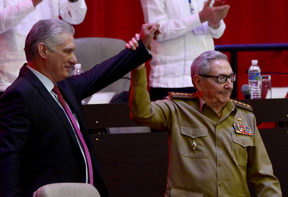 Cubau00e2u20acu2122s President and newly-elected First Secretary of the Communist Party Miguel Diaz-Canel reacts as former Cuban President Raul Castro raises his hand in Havana April 19, 2021. u00e2u20acu201d Picture by Ariel Ley Royero/ACN via Reuters