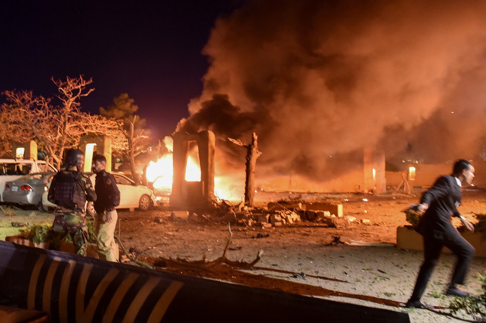 Police and a paramilitary soldier are seen after an explosion at a luxury hotel in Quetta, Pakistan April 21, 2021. u00e2u20acu201d Reuters pic