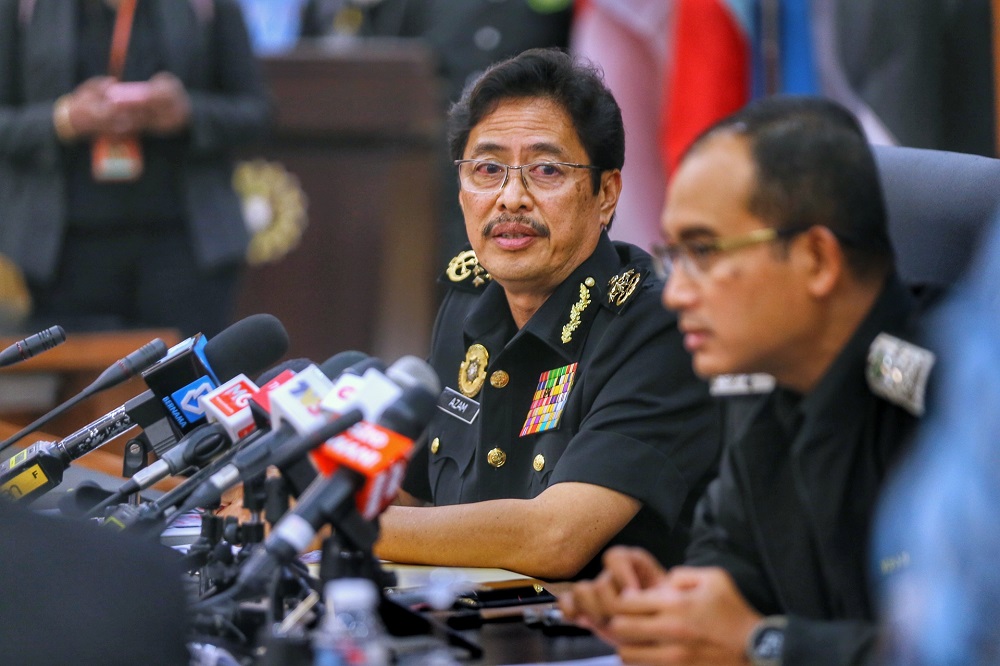 Malaysian Anti-Corruption Commission chief commissioner Datuk Seri Azam Baki (left) speaks during a press conference in Kuala Lumpur April 7, 2021. u00e2u20acu201d Picture by Ahmad Zamzahuri