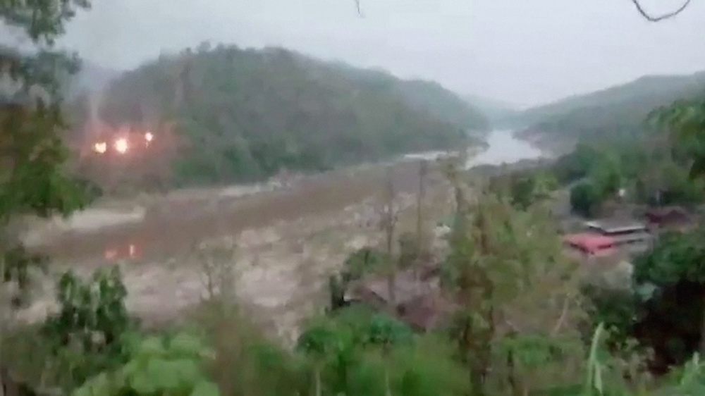 Fires are seen on a forested hillside in Myanmar as shots are heard in the distance, as seen from Mae Sam Laep, a border outpost in northwestern Thailand, April 27, 2021, in this still image from a video obtained by Reuters. u00e2u20acu201d Picture via Reuters