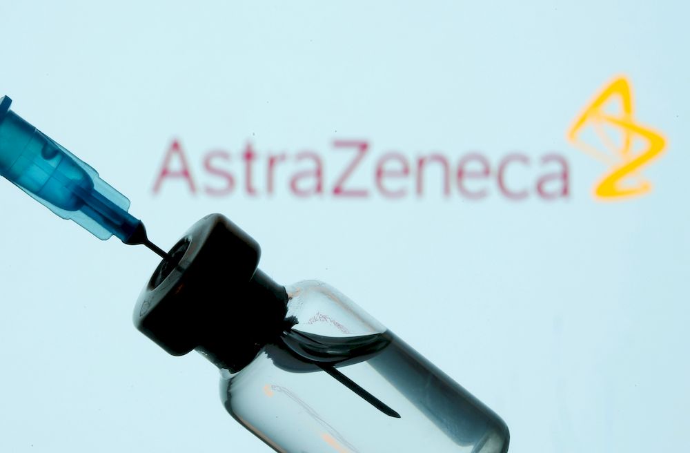 A vial and syringe are seen in front of a displayed AstraZeneca logo in this illustration taken January 11, 2021. u00e2u20acu201d Reuters pic