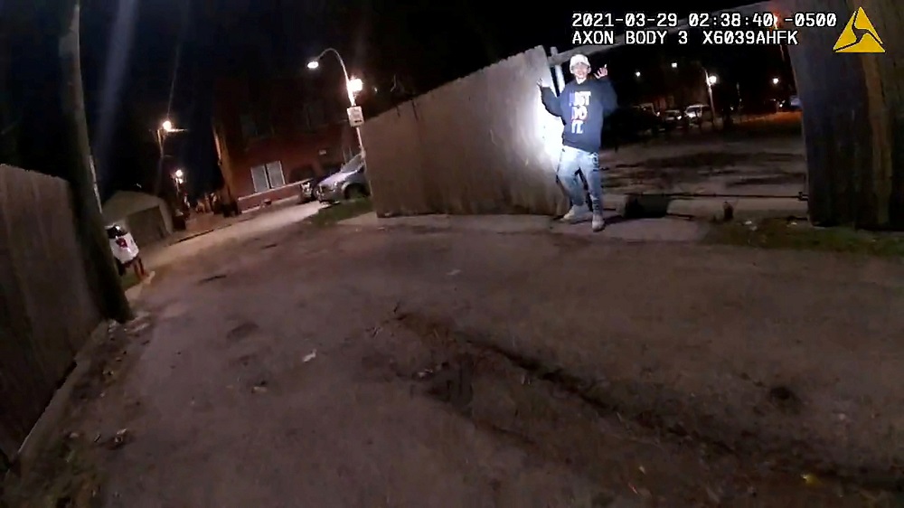 Adam Toledo, 13, holds up his hands a split second before he was shot by police in Little Village, a neighbourhood on the West Side of Chicago, Illinois March 29, 2021 in a still image from police body camera video. u00e2u20acu2022 Handout via Reuters