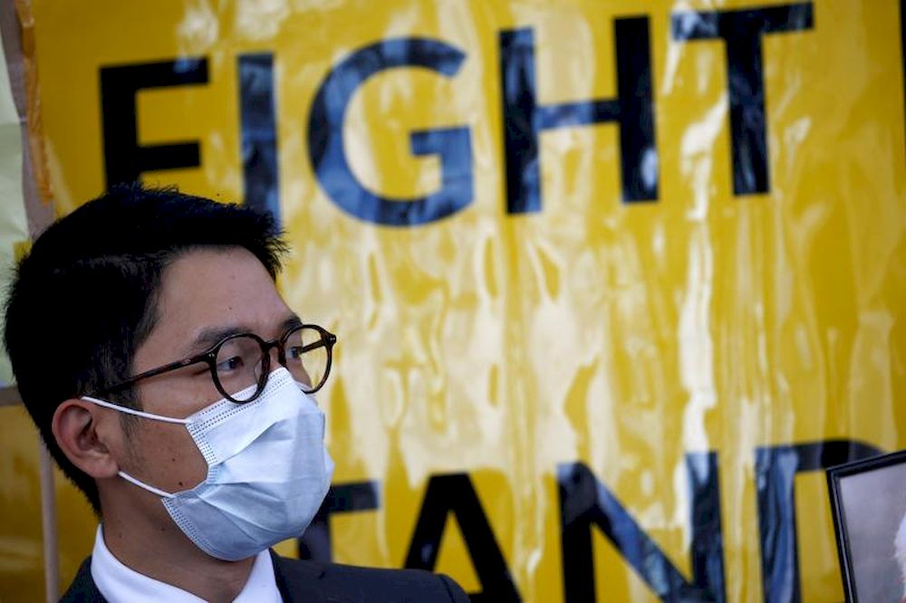 Hong Kong exile pro-democracy activist Nathan Law wearing a face mask holds a rally with other activist groups during Chinau00e2u20acu2122s Foreign Minister Wang Yiu00e2u20acu2122s visit in Berlin, Germany September 1, 2020. u00e2u20acu201d Reuters pic