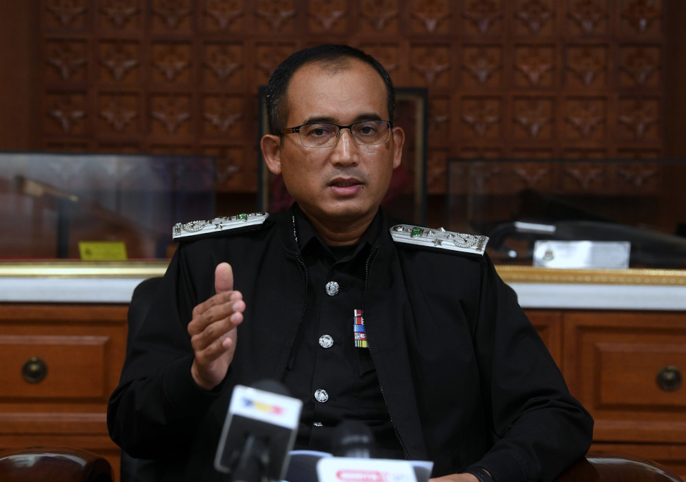 Immigration director-general Datuk Khairul Dzaimee Daud speaking at a press conference on foreigners with expired Social Visit Passes in Putrajaya, April 21, 2021. u00e2u20acu201d Bernama pic 