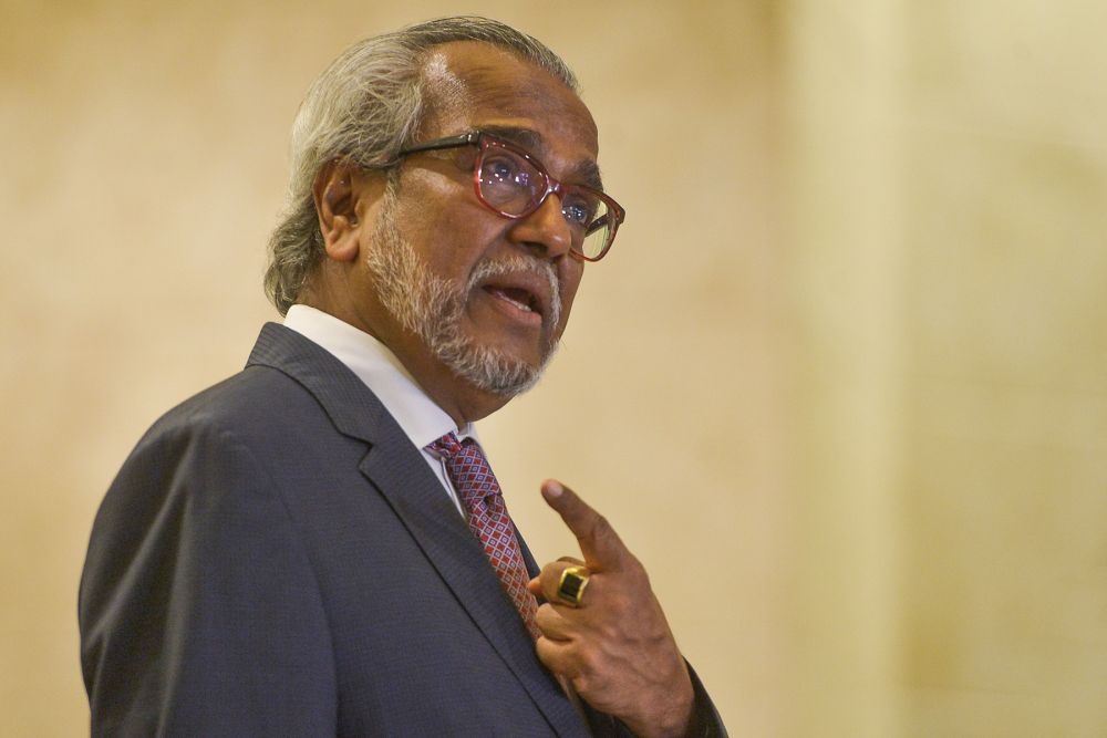 Lawyer Tan Sri Muhammad Shafee Abdullah speaks during a news conference at the Court of Appeal, Putrajaya on April 5, 2021. u00e2u20acu201d Picture by Miera Zulyanann