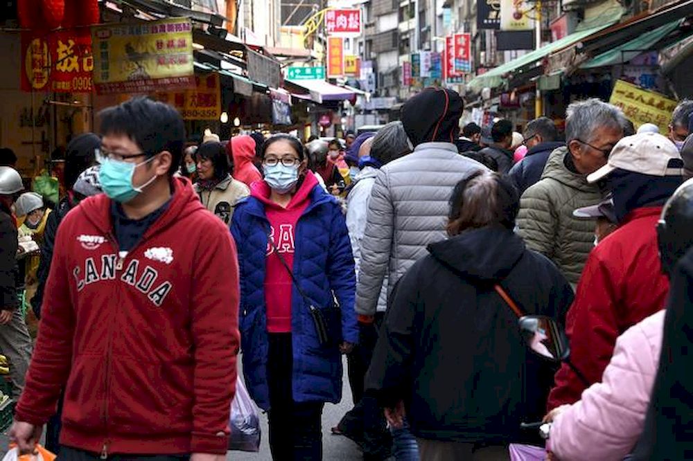 Customers wear protective masks to prevent the spread of the coronavirus disease (Covid-19) while shopping at a market in Taipei, Taiwan, January 10, 2021. u00e2u20acu201d Reuters pic