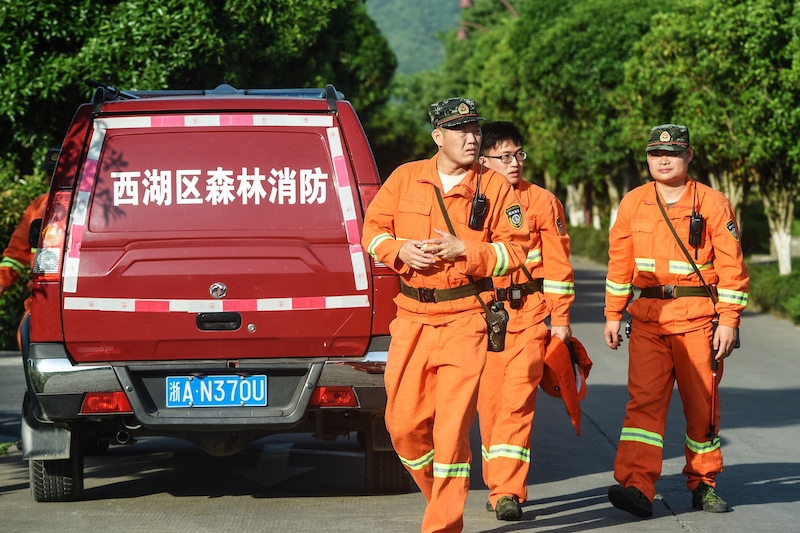 This photo taken on May 9, 2021 shows rescuers searching leopards which escaped from a wild park in Hangzhou, in China's eastern Zhejiang province. u00e2u20acu201d AFP pic