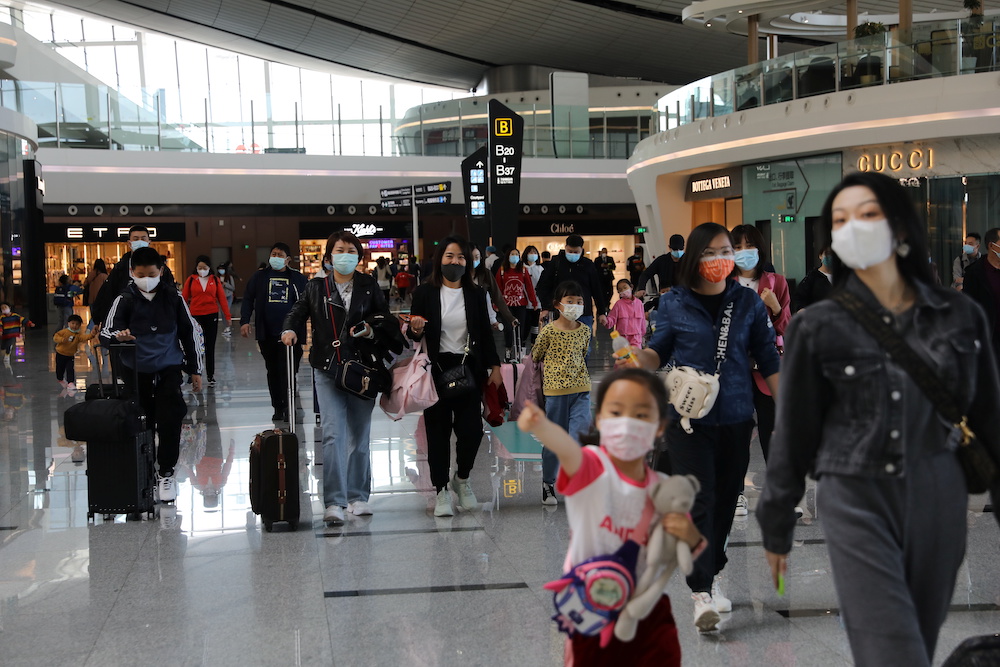 Travellers are seen at the Beijing Daxing International Airport on the first day of Labour Day holiday, in Beijing, China May 1, 2021. u00e2u20acu201d Reuters picnn