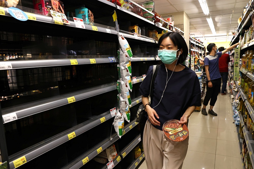 A woman buys instant noodles in a supermarket following the outbreak of coronavirus disease in Taipei, Taiwan May 12, 2021. u00e2u20acu2022 Reuters pic