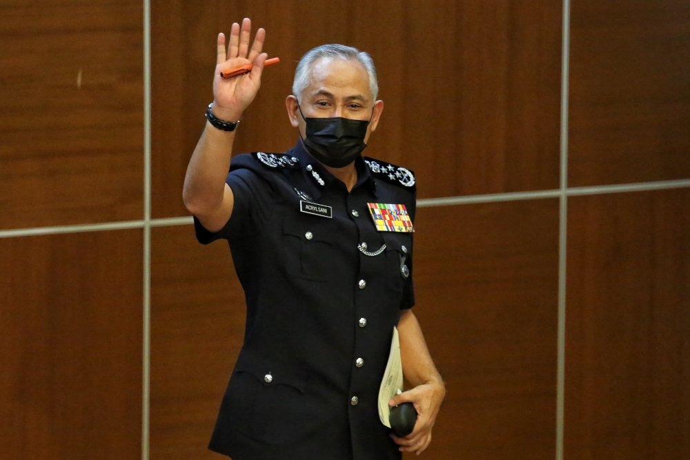 Inspector-General of Police Datuk Seri Acryl Sani Abdullah waves to the media at a press conference in Bukit Aman, May 31, 2021. u00e2u20acu201d Picture by Choo Choy May 