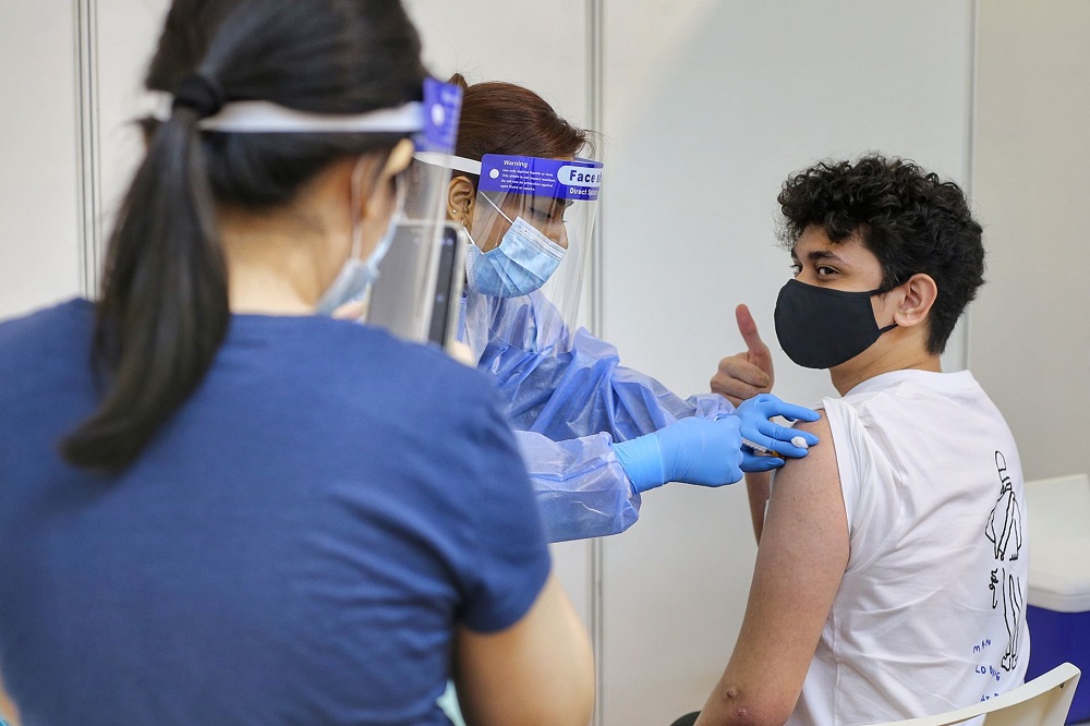 A man receives the AstraZeneca Covid-19 vaccine at the World Trade Centre Kuala Lumpur May 5, 2021. u00e2u20acu2022 Picture by Ahmad Zamzahuri