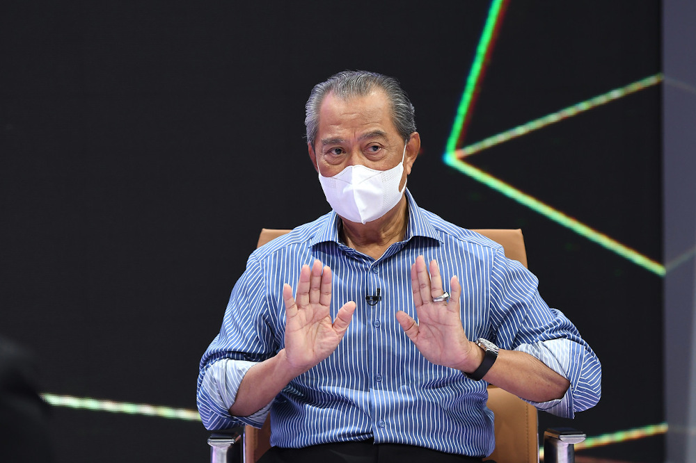 Prime Minister Tan Sri Muhyiddin Yassin speaks during the u00e2u20acu02dcBicara Khasu00e2u20acu2122 programme broadcast at the Angkasapuri building in Kuala Lumpur May 23, 2021. u00e2u20acu201d Bernama pic