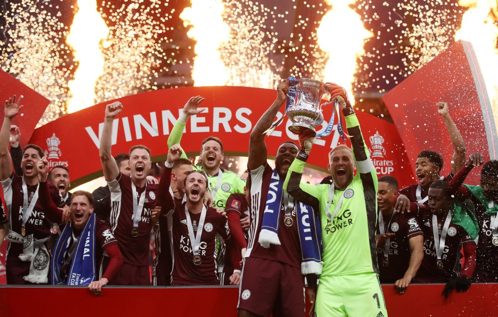Leicester City's Kasper Schmeichel and (front, right) Wes Morgan celebrates with the trophy after winning the FA Cup at the Wembley Stadium May 15, 2021. u00e2u20acu201d Reuters pic