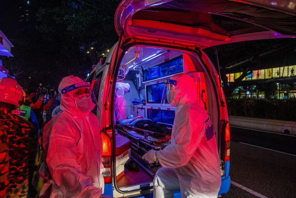 An injured passenger is seen inside an ambulance van, May 24, 2021. u00e2u20acu201d Picture by Firdaus Latif    