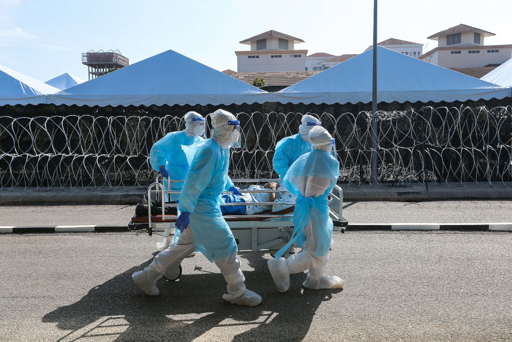 Medical and Malaysian Armed Forces personnel in PPE suits during a dry run session at the Kepala Batas Field Intensive Care Unit, Kepala Batas Hospital May 25, 2021. u00e2u20acu201d Picture by Sayuti Zainudin