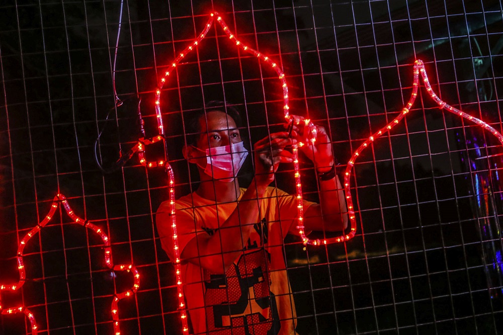 Residents of Kampung Jenjarom in Banting decorate their houses to liven up the mood for Hari Raya Aidilfitri May 11, 2021. u00e2u20acu2022 Picture by Hari Anggara