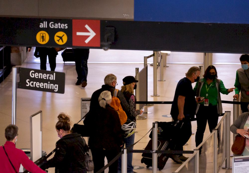 Travellers go through general screening at a security checkpoint at Seattle-Tacoma International Airport in SeaTac, Washington, US April 12, 2021. u00e2u20acu201d Reuters pic