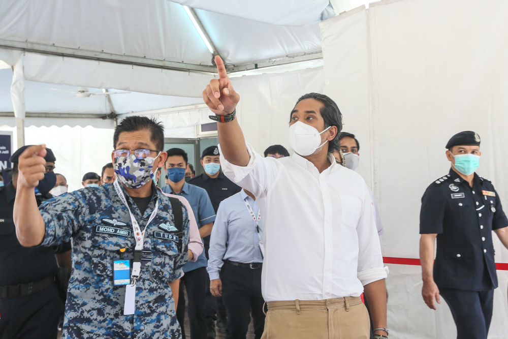 Minister of Science Technology and Innovation Khairy Jamaluddin visits the Covid-19 vaccination centre in Bukit Jalil June 21, 2021. u00e2u20acu201d Picture by Ahmad Zamzahuri 