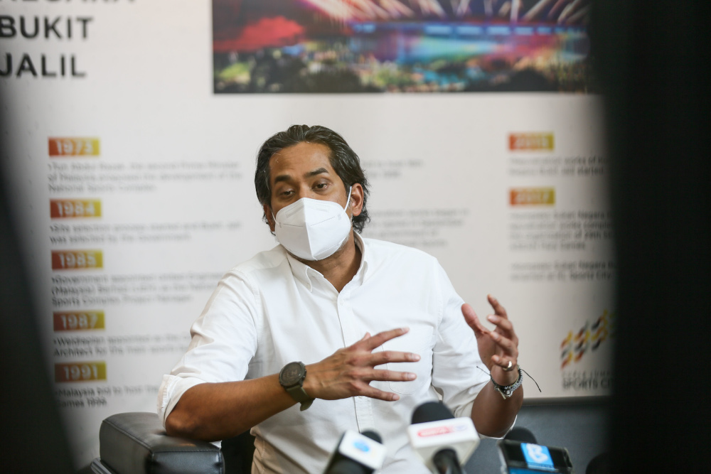 Minister of Science Technology and Innovation Khairy Jamaluddin speaks to the media at the Covid-19 vaccination centre in Bukit Jalil June 21, 2021. u00e2u20acu201d Picture by Ahmad Zamzahuri 