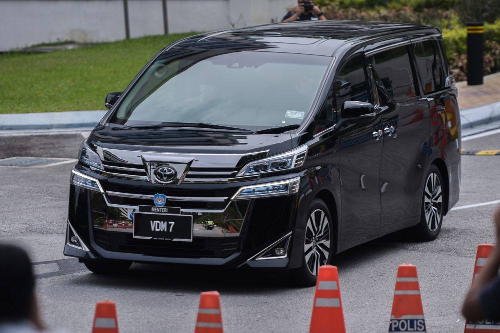 A vehicle ferrying Parti Bersatu Sabah president Datuk Seri Maximus Ongkili  is seen leaving Istana Negara in Kuala Lumpur June 11, 2021.  u00e2u20acu201d Picture by Miera Zulyana