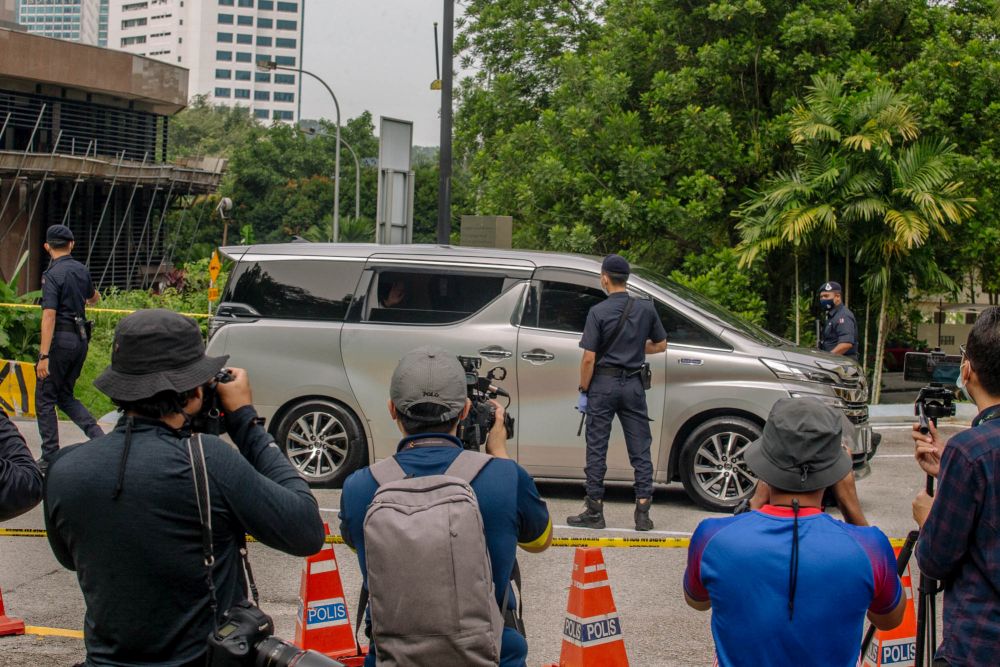 Umno president Datuk Seri Ahmad Zahid Hamidi waves at reporters as he arrives at Istana Negara in Kuala Lumpur June 11, 2021. u00e2u20acu201d Picture by Firdaus Latif