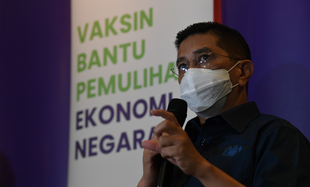 Minister of International Trade and Industry Datuk Mohamed Azmin Ali at a press conference after visiting the Covid-19 Public-Private Partnership (PIKAS) Industrial Immunisation Programme at the Jawi Golf Resort vaccination centre in Penang, June 17, 2021
