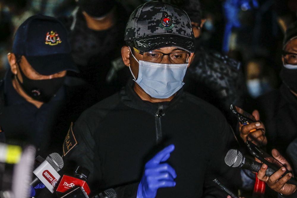 Immigration Department director-general Datuk Khairul Dzaimee Daud addresses media during a raid on a construction site in Southville City, Dengkil June 20, 2021. u00e2u20acu201d Picture by Hari Anggara