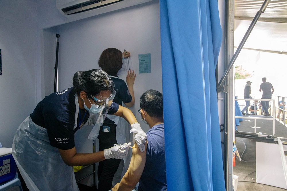 A Gamuda staff receives the first Covid-19 vaccine dose in Kuala Lumpur June 8, 2021. u00e2u20acu2022 Picture by Firdaus Latif