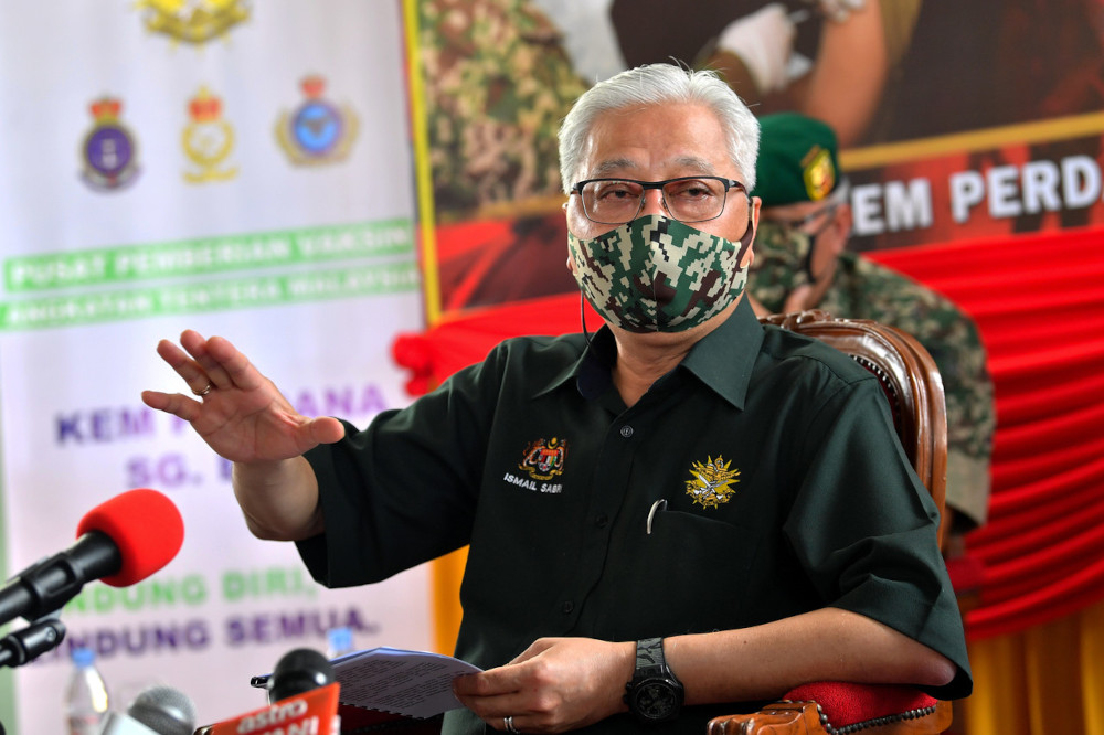 Senior Minister of Defence Datuk Seri Ismail Sabri Yaakob speaks to the media after visiting the drive-through vaccination centre at the Sungai Besi military camp, June 8, 2021. u00e2u20acu201d Bernama pic 