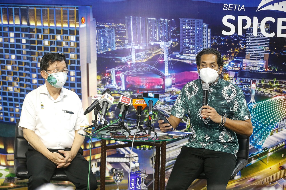 Minister of Science Technology and Innovation Khairy Jamaluddin (right) speaks to reporters after visiting the Vaccine Distribution Centre at the SPICE Arena in George Town June 2, 2021. u00e2u20acu2022 Picture by Sayuti Zainudin