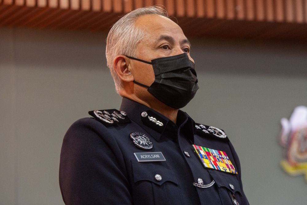Inspector-General of Police Datuk Seri Acryl Sani Abdullah Sani is pictured at newly appointed deputy IGP Datuk Seri Mazlan Lazimu00e2u20acu2122s rank conferment ceremony in Putrajaya, June 25, 2021. u00e2u20acu201d Picture by Shafwan Zaidon