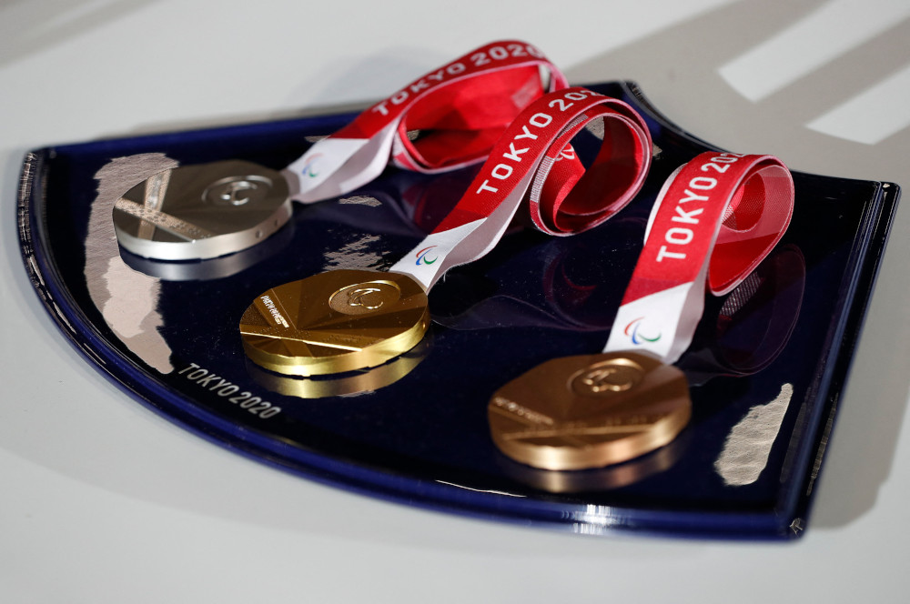 The medals and tray to be used for the medal ceremonies at the Tokyo 2020 Olympics Games are seen during an event to mark 50 days to the opening ceremony, at Ariake Arena in Tokyo June 3, 2021. u00e2u20acu201d AFP picnn