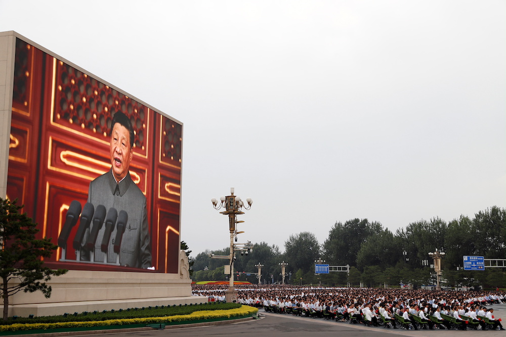 Chinese President Xi Jinping is seen on a giant screen as he delivers a speech at the event marking the 100th founding anniversary of the Communist Party of China, on Tiananmen Square in Beijing, China July 1, 2021. u00e2u20acu201d Reuters pic
