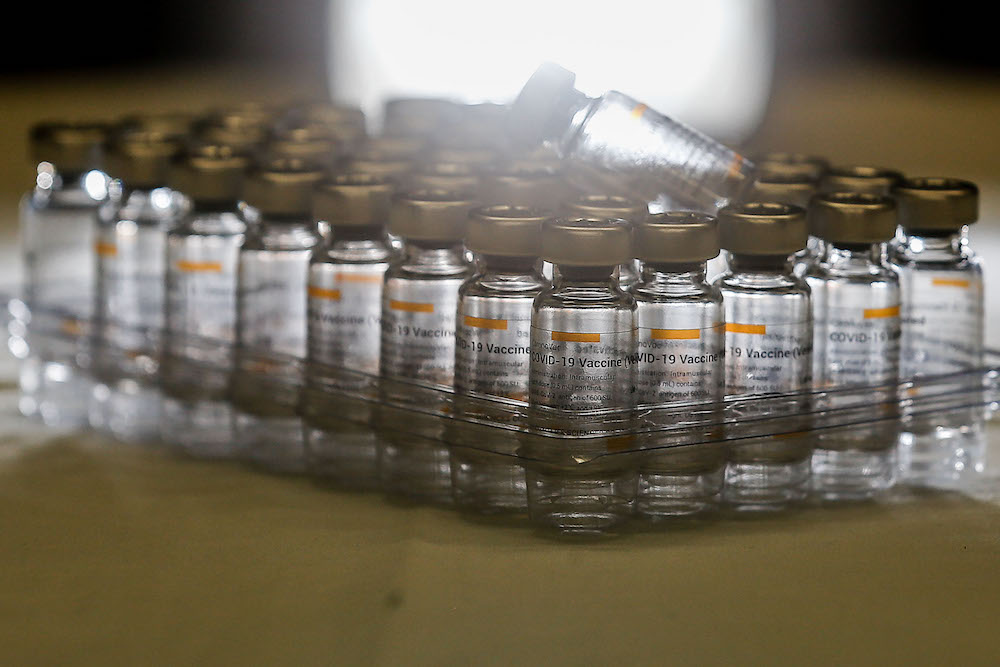 Vials of Sinovac Covid-19 vaccine are seen during the vaccination session for Persons with Disabilities in St Nicholas Home, Bagan Jermal July 5, 2021. u00e2u20acu201d Picture by Sayuti Zainudin