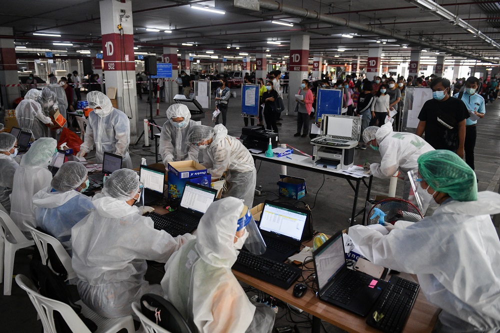 People queue for free coronavirus disease rapid antigen tests at a mass testing station, as the spread of Covid-19 continues, in Bangkok July 15, 2021.  u00e2u20acu201d Bangkok