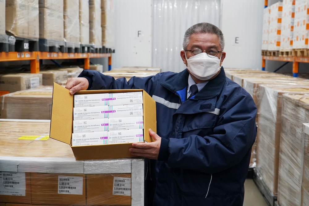 Health Minister Datuk Seri Dr Adham Baba holds a box of AstraZeneca Covid-19 vaccine July 2, 2021. u00e2u20acu201d Picture courtesy of AstraZeneca 