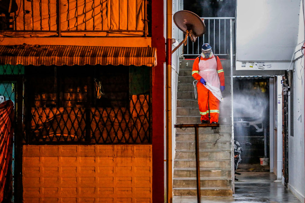 DBKL Health and Environment Department staff conduct a sanitisation operation at the Section 1 Wangsa Maju housing area and public areas, July 6, 2020. u00e2u20acu201d Picture by Hari Anggara