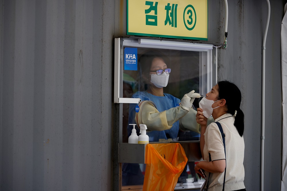 A woman gets tested for Covid-19 in Seoul, South Korea July 15, 2021. u00e2u20acu2022 Reuters file pic