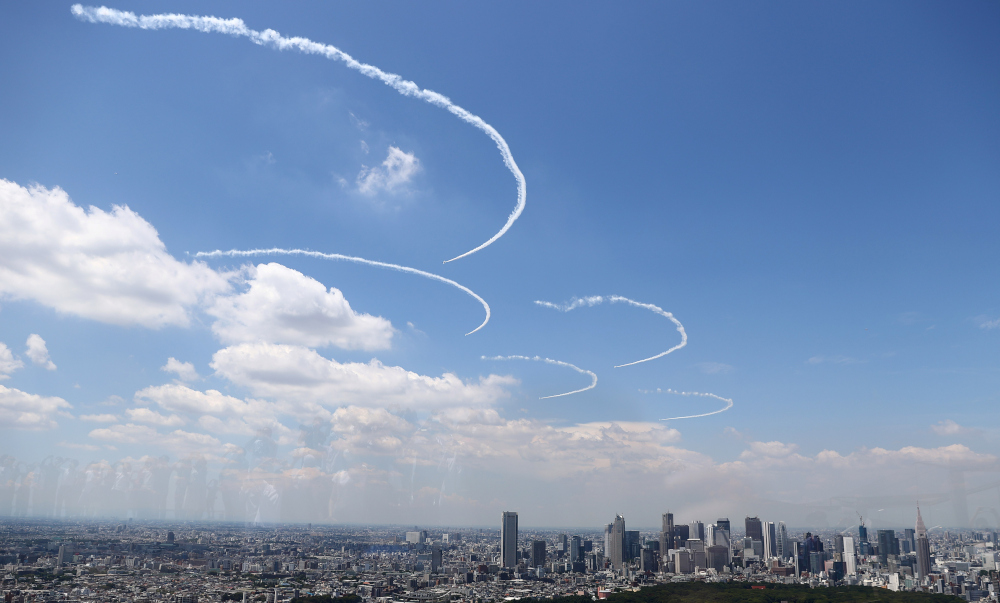 Japanu00e2u20acu2122s aerobatics team, the Blue Impulse skywrite the Olympic rings in a practice run ahead of the official opening of the Tokyo 2020 Olympic Games, in Tokyo, Japan, July 21, 2021. u00e2u20acu201d Reuters picnn