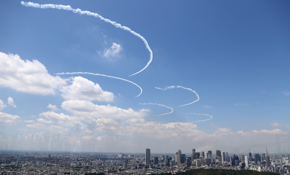 Japanu00e2u20acu2122s aerobatics team, the Blue Impulse skywrite the Olympic rings in a practice run ahead of the official opening of the Tokyo 2020 Olympic Games, in Tokyo, Japan, July 21, 2021. u00e2u20acu201d Reuters picnn