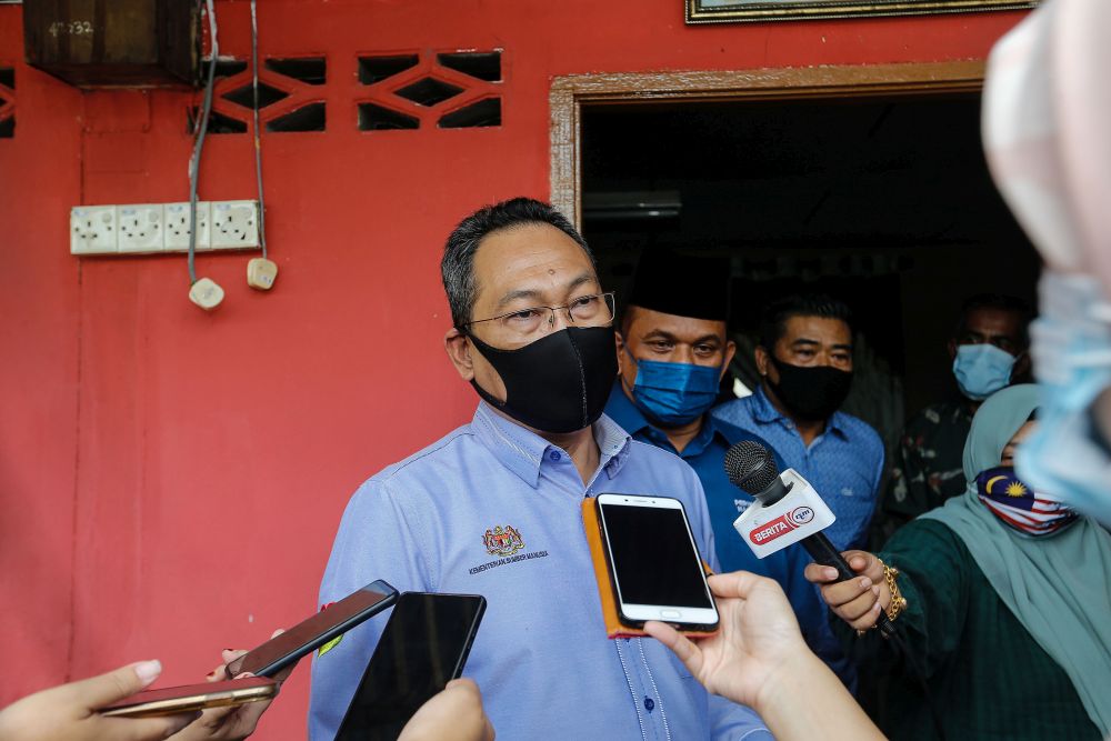 Deputy Human Resources Minister Datuk Awang Hashim speaks to members of the press during a visit to Teluk Bahang, George Town July 5, 2021. u00e2u20acu201d Picture by Sayuti Zainudinnn