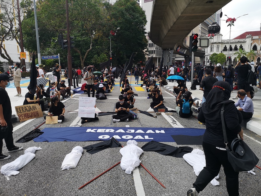 A crowd gathered at the Masjid Jamek LRT Station ahead of the #Lawan protest today, July 31, 2021. u00e2u20acu2022 Picture by Shafwan Zaidon 