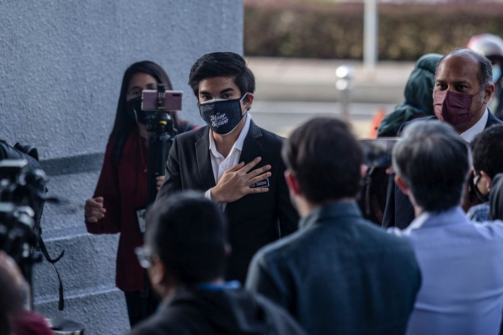 Muar MP Syed Saddiq Syed Abdul Rahman arrives at the Kuala Lumpur Court Complex July 22, 2021. u00e2u20acu201d Picture by Firdaus Latif