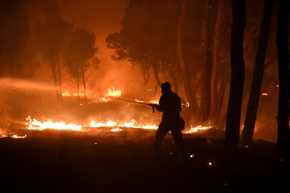 Firefighters battle a wildfire burning in the suburb of Thrakomakedones, north of Athens August 7, 2021. u00e2u20acu201d Reuters pic