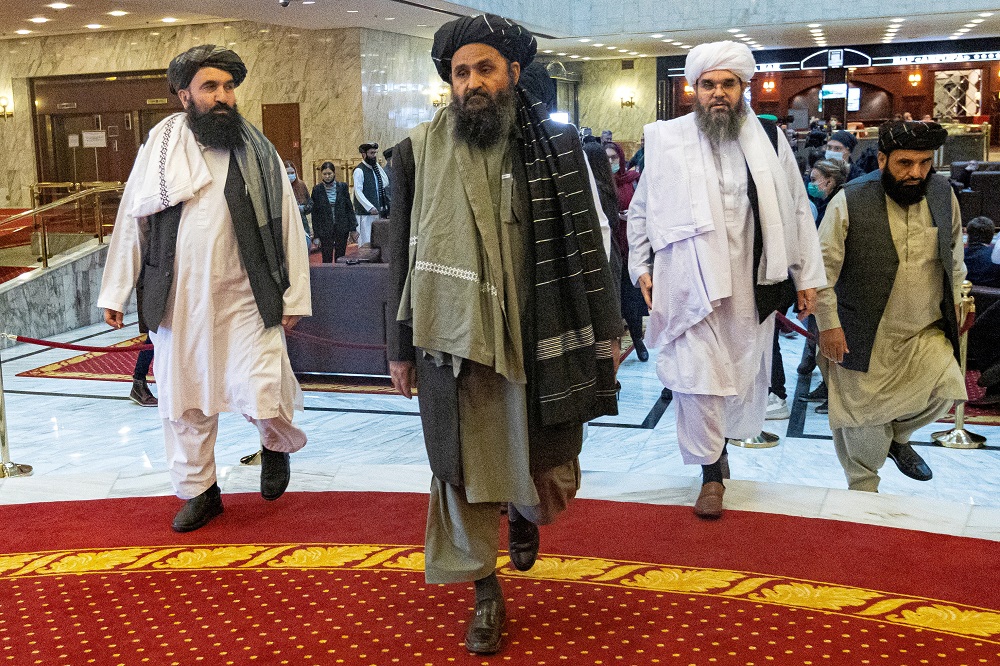 Mullah Abdul Ghani Baradar, the Talibanu00e2u20acu2122s deputy leader and negotiator, and other delegation members attend the Afghan peace conference in Moscow March 18, 2021. u00e2u20acu201d Picture by Alexander Zemlianichenko/Pool via Reuters
