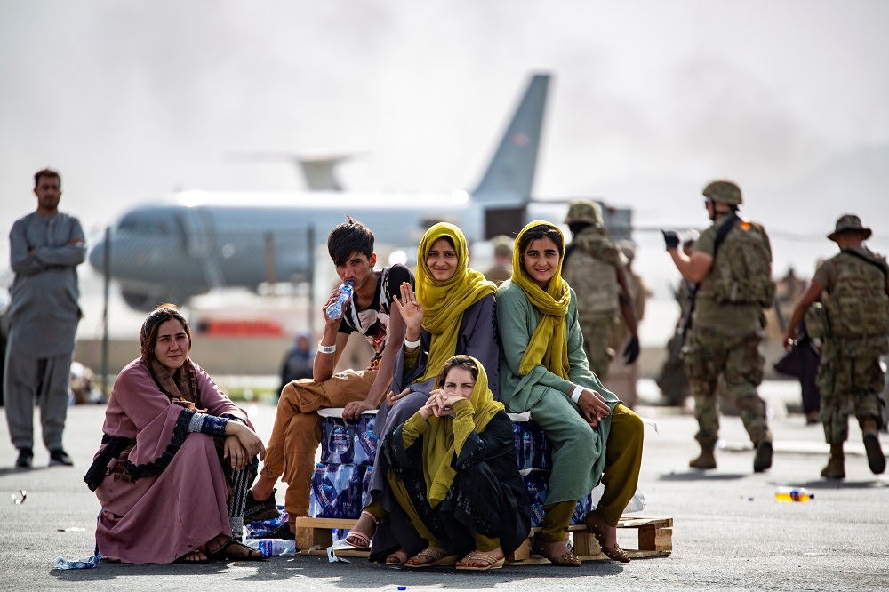 Evacuee children wait for the next flight after being manifested at Hamid Karzai International Airport, in Kabul August 19, 2021. u00e2u20acu201d Picture courtesy of US Marine Corps/Handout via Reuters