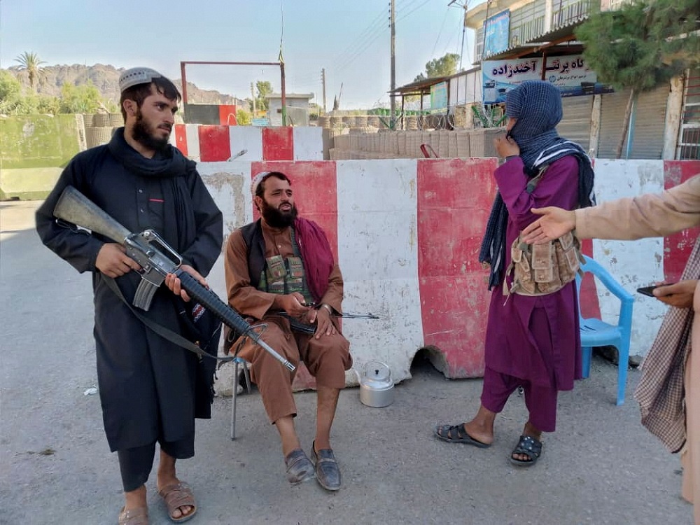 Taliban fighters stand guard at a check point in Farah, Afghanistan August 11, 2021. u00e2u20acu2022 Reuters pic