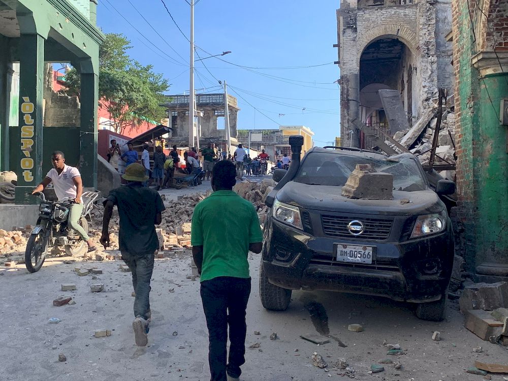 Damage is seen in an area after a major earthquake struck southwestern Haiti, in Jeremie, Haiti August 14, 2021. u00e2u20acu201d Courtesy of Twitter @JCOMHaiti / Social Media via Reuters