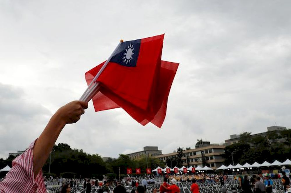 An audience waves Taiwanese flags during the National Day celebrations in Taipei, Taiwan October 10, 2018. u00e2u20acu201d Reuters pic